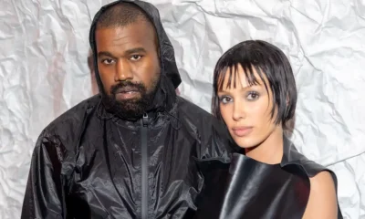 Bianca Censori Ousa com Body Dourado e Botas em Passeio com Kanye West na Suíça